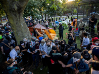 Thousands are marching outside the DNC in Chicago, Illinois, on August 19, 2024, to protest the war on Gaza. At the end of the march, a grou...