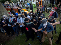 Thousands are marching outside the DNC in Chicago, Illinois, on August 19, 2024, to protest the war on Gaza. At the end of the march, a grou...