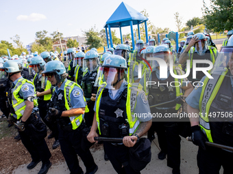 Thousands are marching outside the DNC in Chicago, Illinois, on August 19, 2024, to protest the war on Gaza. At the end of the march, a grou...