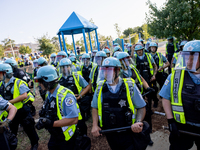 Thousands are marching outside the DNC in Chicago, Illinois, on August 19, 2024, to protest the war on Gaza. At the end of the march, a grou...