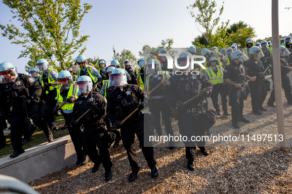 Thousands are marching outside the DNC in Chicago, Illinois, on August 19, 2024, to protest the war on Gaza. At the end of the march, a grou...