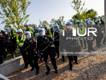 Thousands are marching outside the DNC in Chicago, Illinois, on August 19, 2024, to protest the war on Gaza. At the end of the march, a grou...