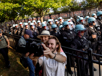 Thousands are marching outside the DNC in Chicago, Illinois, on August 19, 2024, to protest the war on Gaza. At the end of the march, a grou...