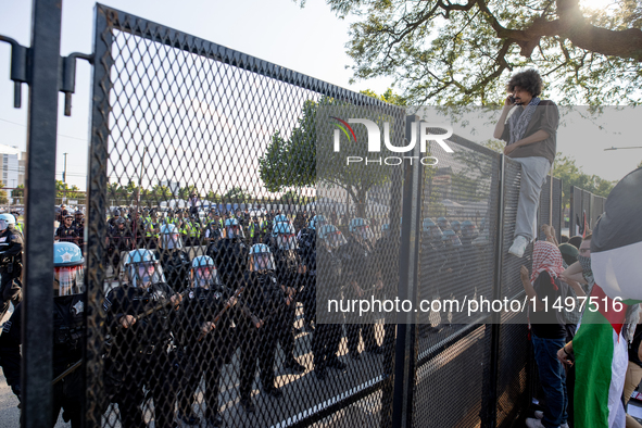 Thousands are marching outside the DNC in Chicago, Illinois, on August 19, 2024, to protest the war on Gaza. At the end of the march, a grou...