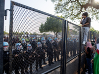 Thousands are marching outside the DNC in Chicago, Illinois, on August 19, 2024, to protest the war on Gaza. At the end of the march, a grou...