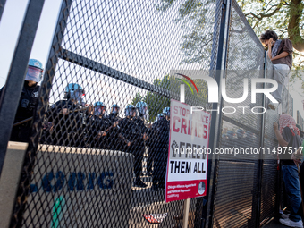 Thousands are marching outside the DNC in Chicago, Illinois, on August 19, 2024, to protest the war on Gaza. At the end of the march, a grou...