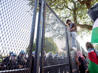 Thousands are marching outside the DNC in Chicago, Illinois, on August 19, 2024, to protest the war on Gaza. At the end of the march, a grou...