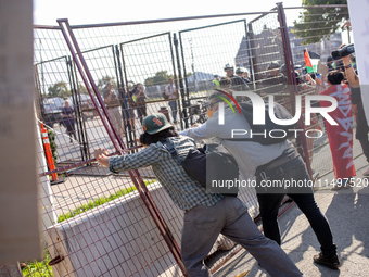 Thousands are marching outside the DNC in Chicago, Illinois, on August 19, 2024, to protest the war on Gaza. At the end of the march, a grou...