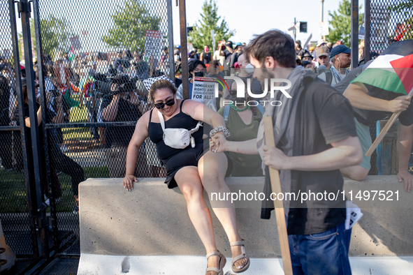 Thousands are marching outside the DNC in Chicago, Illinois, on August 19, 2024, to protest the war on Gaza. At the end of the march, a grou...