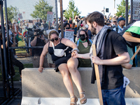 Thousands are marching outside the DNC in Chicago, Illinois, on August 19, 2024, to protest the war on Gaza. At the end of the march, a grou...