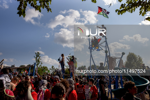 Thousands are marching outside the DNC in Chicago, Illinois, on August 19, 2024, to protest the war on Gaza. At the end of the march, a grou...