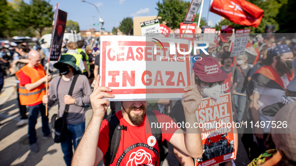 Thousands are marching outside the DNC in Chicago, Illinois, on August 19, 2024, to protest the war on Gaza. At the end of the march, a grou...