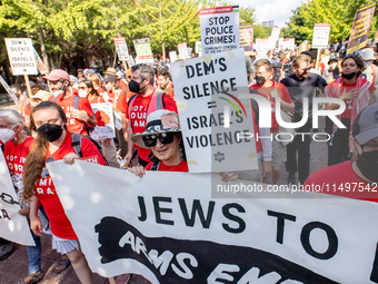 Thousands are marching outside the DNC in Chicago, Illinois, on August 19, 2024, to protest the war on Gaza. At the end of the march, a grou...