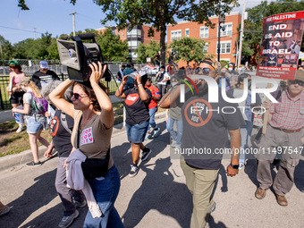 Thousands are marching outside the DNC in Chicago, Illinois, on August 19, 2024, to protest the war on Gaza. At the end of the march, a grou...