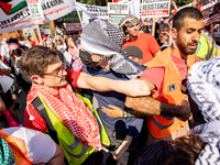 Thousands are marching outside the DNC in Chicago, Illinois, on August 19, 2024, to protest the war on Gaza. At the end of the march, a grou...