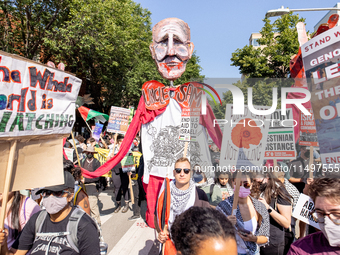 Thousands are marching outside the DNC in Chicago, Illinois, on August 19, 2024, to protest the war on Gaza. At the end of the march, a grou...