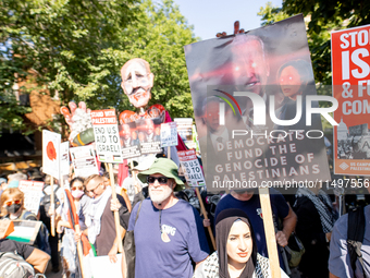 Thousands are marching outside the DNC in Chicago, Illinois, on August 19, 2024, to protest the war on Gaza. At the end of the march, a grou...