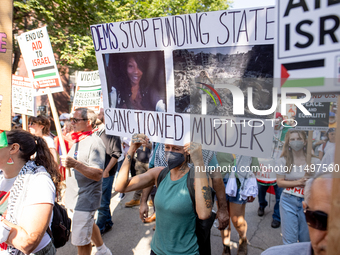 Thousands are marching outside the DNC in Chicago, Illinois, on August 19, 2024, to protest the war on Gaza. At the end of the march, a grou...