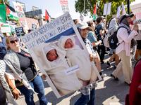 Thousands are marching outside the DNC in Chicago, Illinois, on August 19, 2024, to protest the war on Gaza. At the end of the march, a grou...