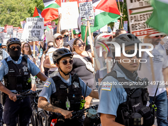 Thousands are marching outside the DNC in Chicago, Illinois, on August 19, 2024, to protest the war on Gaza. At the end of the march, a grou...