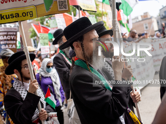 Thousands are marching outside the DNC in Chicago, Illinois, on August 19, 2024, to protest the war on Gaza. At the end of the march, a grou...