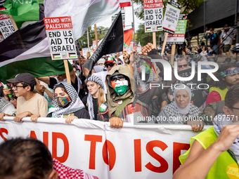 Thousands are marching outside the DNC in Chicago, Illinois, on August 19, 2024, to protest the war on Gaza. At the end of the march, a grou...