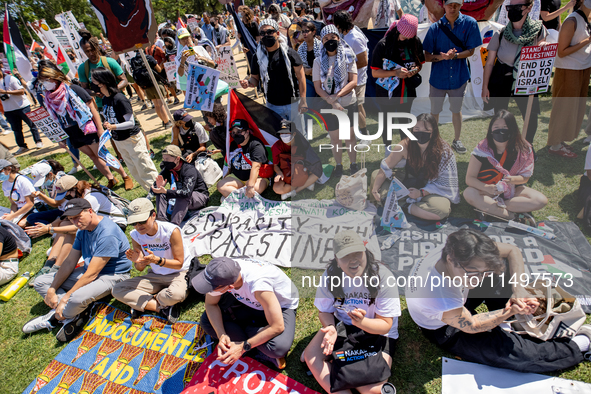 Thousands are marching outside the DNC in Chicago, Illinois, on August 19, 2024, to protest the war on Gaza. At the end of the march, a grou...