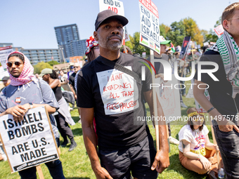 Thousands are marching outside the DNC in Chicago, Illinois, on August 19, 2024, to protest the war on Gaza. At the end of the march, a grou...