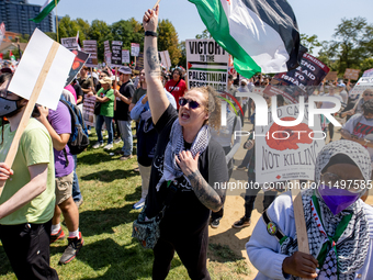 Thousands are marching outside the DNC in Chicago, Illinois, on August 19, 2024, to protest the war on Gaza. At the end of the march, a grou...