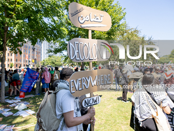 Thousands are marching outside the DNC in Chicago, Illinois, on August 19, 2024, to protest the war on Gaza. At the end of the march, a grou...