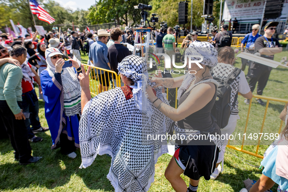 Thousands are marching outside the DNC in Chicago, Illinois, on August 19, 2024, to protest the war on Gaza. At the end of the march, a grou...