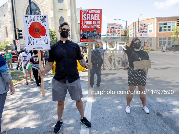 Thousands are marching outside the DNC in Chicago, Illinois, on August 19, 2024, to protest the war on Gaza. At the end of the march, a grou...