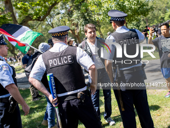 Thousands are marching outside the DNC in Chicago, Illinois, on August 19, 2024, to protest the war on Gaza. At the end of the march, a grou...