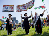 Thousands are marching outside the DNC in Chicago, Illinois, on August 19, 2024, to protest the war on Gaza. At the end of the march, a grou...