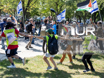 Thousands are marching outside the DNC in Chicago, Illinois, on August 19, 2024, to protest the war on Gaza. At the end of the march, a grou...