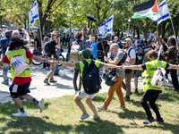 Thousands are marching outside the DNC in Chicago, Illinois, on August 19, 2024, to protest the war on Gaza. At the end of the march, a grou...