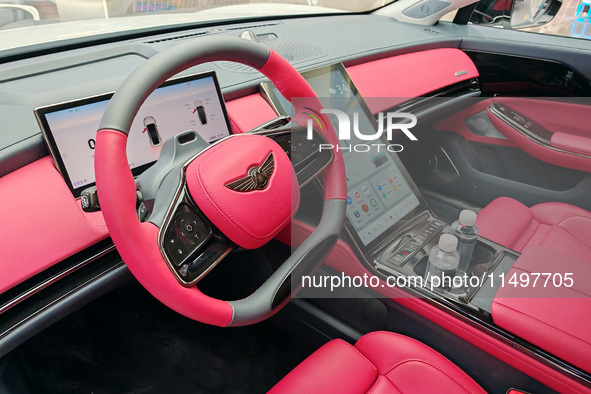 A new energy vehicle is displayed at a Yuanhang auto shop in Shanghai, China, on August 21, 2024. 