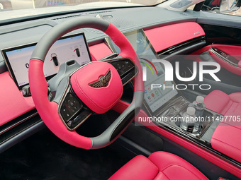 A new energy vehicle is displayed at a Yuanhang auto shop in Shanghai, China, on August 21, 2024. (