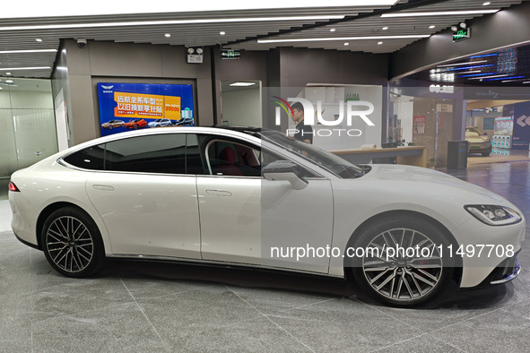 A new energy vehicle is displayed at a Yuanhang auto shop in Shanghai, China, on August 21, 2024. 