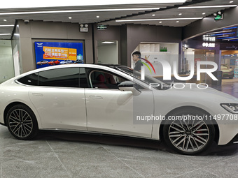 A new energy vehicle is displayed at a Yuanhang auto shop in Shanghai, China, on August 21, 2024. (