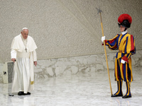 Pope Francis arrives for the weekly general audience in The Vatican, on August 21, 2024, at Paul-VI hall. (