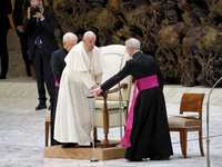 Pope Francis arrives for the weekly general audience in The Vatican, on August 21, 2024, at Paul-VI hall. (