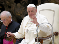 Pope Francis arrives for the weekly general audience in The Vatican, on August 21, 2024, at Paul-VI hall. (