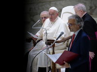 Pope Francis delivers his message during the weekly general audience at the Vatican, on August 21, 2024. (