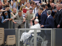 Pope Francis greets people at the end of the weekly general audience in The Vatican, on August 21, 2024, at Paul-VI hall. (