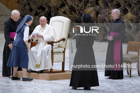 Pope Francis attends the weekly general audience in The Vatican, on June 26, 2024, at Aula Paolo VI. 