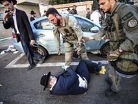 Israeli police officers intervene in Ultra-Orthodox Jews, also known as Haredim, who gather to stage a protest against mandatory military se...