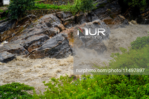 Bagmati River floods and affects riverbanks during heavy rainfall in Kathmandu, Nepal, on August 21, 2024 