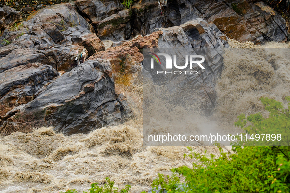 Bagmati River floods and affects riverbanks during heavy rainfall in Kathmandu, Nepal, on August 21, 2024 