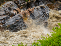 Bagmati River floods and affects riverbanks during heavy rainfall in Kathmandu, Nepal, on August 21, 2024 (